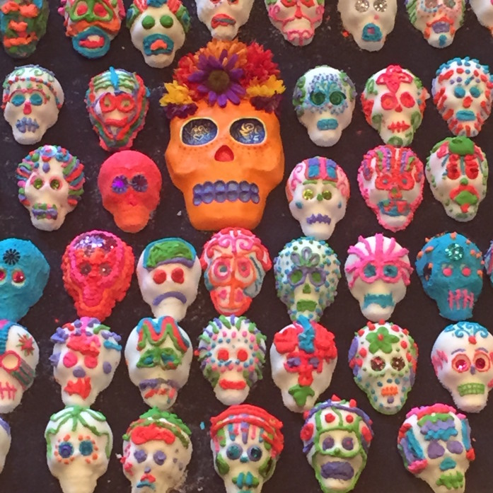 Skulls, including these sugar ones, play a key figure in this festival