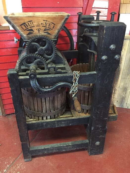 Traditional apple press to make cider at Cold Hollow Cider