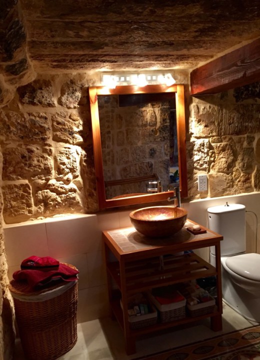 Gorgeous bathroom in a restored farmhouse in Gozo
