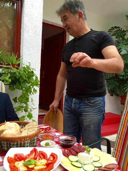 Emir serving us his delicious Bosnian breakfast in Mostar